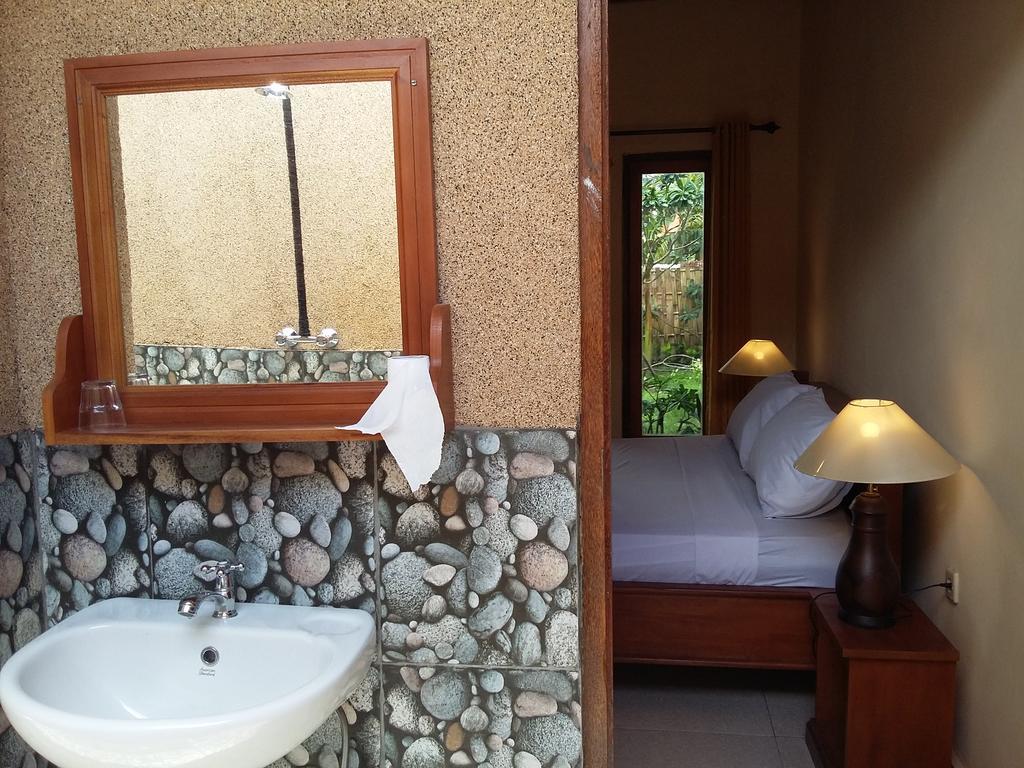 Molleh Guest House เปมูเตรัน ห้อง รูปภาพ